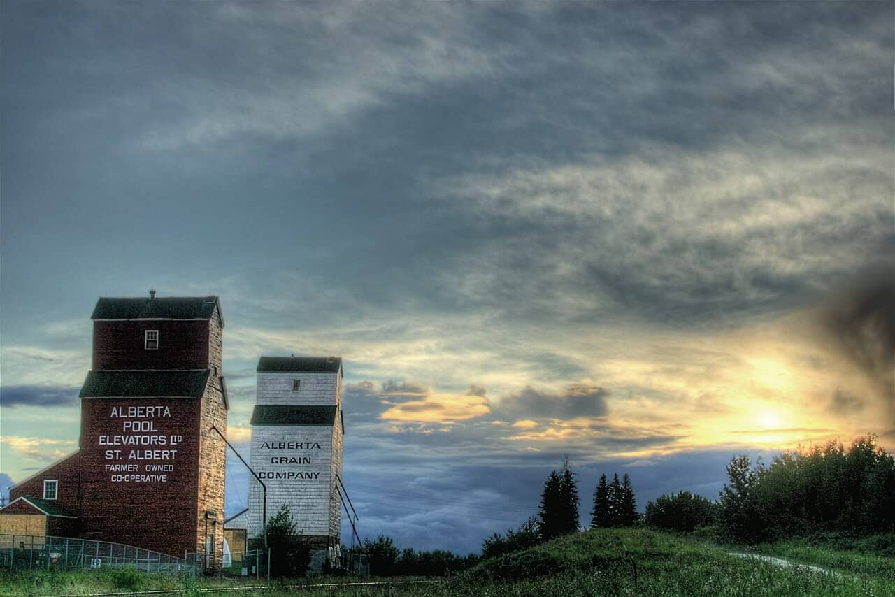 Heritage grain elevators in St. Albert, Alberta at dusk
